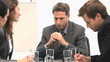A meeting between coworkers A meeting between coworkers