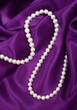 White pearls on a lilac silk White pearls on a lilac silk
