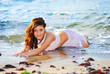Sexy woman is lying on a beach Sexy woman is lying on a beach