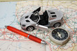 toy car on a geographical atlas toy car on a geographical atlas