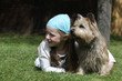 young girl with her cairn terrier young girl with her cairn terrier