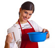 Frau mit Mixer und Schüssel