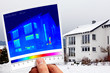 modern one-family house and thermal imaging with woman and cat