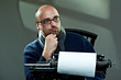 Portrait of a bald writer
