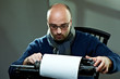 Portrait of a bald writer Portrait of a bald writer