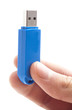 hand and pen drive