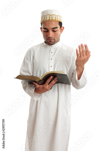 Photo: Teacher or Preacher reading from a book Teacher or Preacher reading from a book