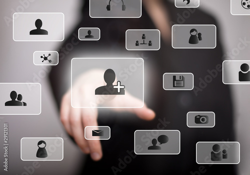 Photo: hand pressing social media buttons hand pressing social media buttons