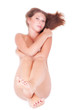 Beautiful naked girl lying down selective focus on the foots