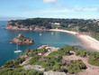 Yachts moored in the sandy cove of Portelet Bay, Jersey