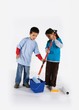 Little two workers with paint roller and blue pail