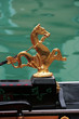 Venice symbol: golden sea horse decoration in a gondola