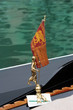 Venice symbol: city's flag as a gondola decoration