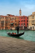 Venice: Traditional gondola on a romantic ride in Rialto Venice: Traditional gondola on a romantic ride in Rialto