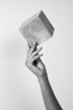 hand and cube
