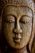 wood craft of lord buddha face on the door of Thai style temple