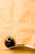 Feather and ink bottle isolated on paper background