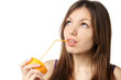 woman drinking fresh orange juice