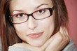 Foto: Junge Frau mit Brille Junge Frau mit Brille