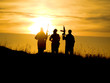 soldiers against a sunset