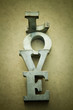 message of love with metal letters