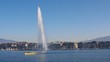 Jet d'Eau fountain in Geneva and touristic boat