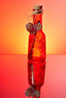 Red bottle for St. Valentine with love letter in it Red bottle for St. Valentine with love letter in it