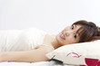 a portrait of beautiful asian woman on the bed