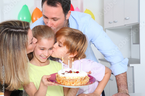 Photo: Family celebrating child's birthday Family celebrating child's birthday