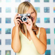 Pretty woman photographer taking photo Pretty woman photographer taking photo