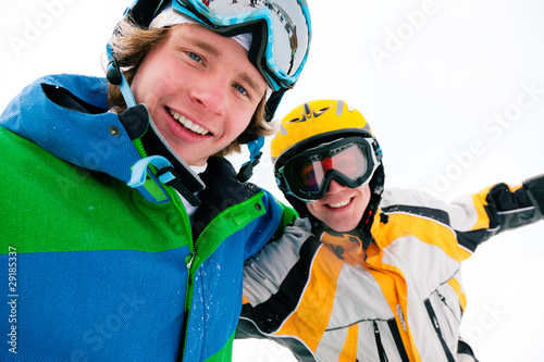 Foto: Schifahrer und Snowboarder Schifahrer und Snowboarder