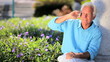 Senior Male With Cell Phone Outdoors