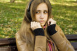 Young woman with headphones in the park