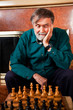 Senior man playing chess