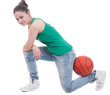 Beautiful young basketball woman in studio