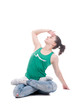 Young teenage woman dancing on white