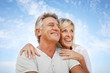 Happy mature couple outdoors.