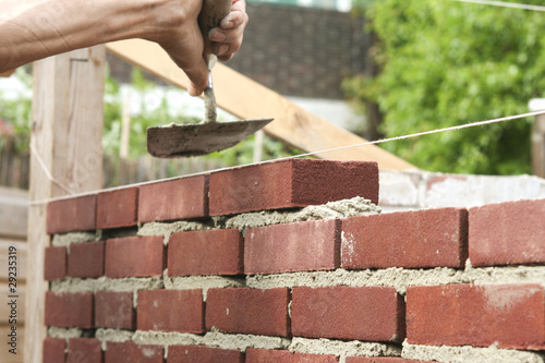 Photo: Bricklayer with trowel Bricklayer with trowel