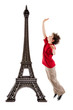 Eiffel tower and boy jumping isolated on white Eiffel tower and boy jumping isolated on white