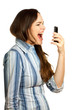 Angry and frustrated business woman yelling at her phone Angry and frustrated business woman yelling at her phone
