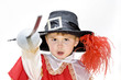 Foto: Boy with carnival costume . Little fighting musketeer. Boy with carnival costume . Little fighting musketeer.