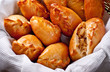 Basket full of patties with cabbage stuffing close up