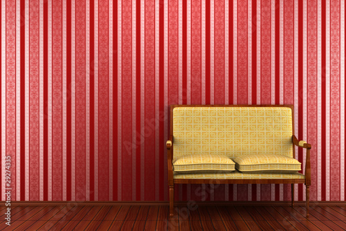 Photo: yellow classic sofa in front of red striped wall yellow classic sofa in front of red striped wall
