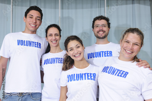 Photo: happy and cheerful volunteer group happy and cheerful volunteer group