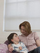Mother Reading to Son