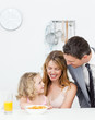 Family having breakfast together