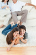 Photo: Family watching tv in the living room Family watching tv in the living room
