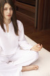 Woman meditating, cropped, portrait