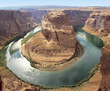 Water surrounding rock formation, elevated view