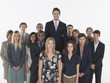 Group of businesspeople, man standing taller